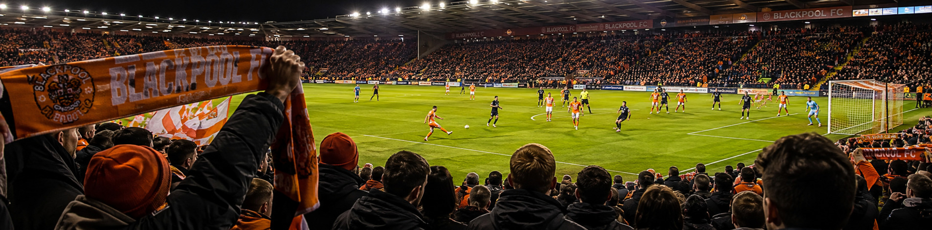 Blackpool FC matchday artwork showing supporters and a football match at Bloomfield Road